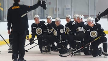 BOSTON - JUNE 26: The first group take a knee as they get instructions before a drill during a Boston Bruins development camp at Warrior Ice Arena in the Brighton neighborhood of Boston on June 26, 2019. (Photo by John Tlumacki/The Boston Globe via Getty Images)