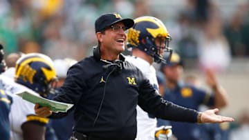 EAST LANSING, MI - OCTOBER 29: Head coach Jim Harbaugh reacts on the sidelines while playing the Michigan State Spartans at Spartan Stadium on October 29, 2016 in East Lansing, Michigan. Michigan won the game 32-23. (Photo by Gregory Shamus/Getty Images)