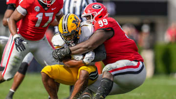 Jordan Davis tackles Missouri running back Tyler Badie. (Photo By: Dale Zanine-USA TODAY Sports)