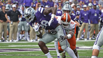 MANHATTAN, KS - SEPTEMBER 07: Defensive back Jamari Bozeman #13 of the Bowling Green Falcons tackles running back Jacardia Wright #28 of the Kansas State Wildcats during the second half at Bill Snyder Family Football Stadium on September 7, 2019 in Manhattan, Kansas. (Photo by Peter G. Aiken/Getty Images)