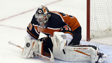 Apr 15, 2021; Pittsburgh, Pennsylvania, USA; Philadelphia Flyers goaltender Carter Hart (79) makes the game winning save against Pittsburgh Penguins defenseman Kris Letang (not pictured) in the shootout at PPG Paints Arena. The Flyers won 2-1 in a shootout. Mandatory Credit: Charles LeClaire-USA TODAY Sports