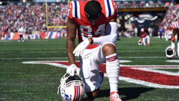 Oct 9, 2022; Foxborough, Massachusetts, USA; New England Patriots wide receiver Kendrick Bourne (84) takes a knee before a game against the Detroit Lions at Gillette Stadium. Mandatory Credit: Bob DeChiara-USA TODAY Sports