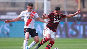 LIMA, PERU - NOVEMBER 23: Rafael Santos Borre of River Plate fights for the ball with Pablo Mari of Flamengo during the final match of Copa CONMEBOL Libertadores 2019 between Flamengo and River Plate at Estadio Monumental on November 23, 2019 in Lima, Peru. (Photo by Manuel Velasquez/Getty Images)