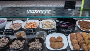 BERLIN, GERMANY - JANUARY 25: Vegan sausage products are displayed at the vegan butchery Vetzgerei by owner Sarah Pollinger on January 25, 2018 in Berlin, Germany. The butchery, designed by Miriam Engelkamp, offers purely herbal cold cuts and spreads based on seitan and tofu. Since vegan and vegetarian food is a growing trend, more and more stores are specializing in pure herbal products as an alternative to conventional food. (Photo by Steffi Loos/Getty Images)