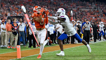 CLEMSON, SOUTH CAROLINA - SEPTEMBER 17: Antonio Williams #0 of the Clemson Tigers makes a touchdown catch against Myles Brooks #13 of the Louisiana Tech Bulldogs during the second half of their game at Memorial Stadium on September 17, 2022 in Clemson, South Carolina. (Photo by Grant Halverson/Getty Images)