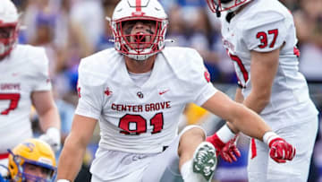 Center Grove Trojans Caden Curry (91) yells in excitement after stopping Carmel Greyhounds on a third down Friday, September 3, 2021, at Carmel High School in Carmel. Center Grove Trojans lead at the half against the Carmel Greyhounds, 10-7.09032021 Carmel Vs Center Grove Fnl