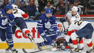 TORONTO, CANADA - MAY 2: Auston Matthews #34 of the Toronto Maple Leafs jumps to screen Sergei Bobrovsky #72 of the Florida Panthers from an incoming puck during Game One of the Second Round of the 2023 Stanley Cup Playoffs at Scotiabank Arena on May 2, 2023 in Toronto, Ontario, Canada. The Panthers defeated the Maple Leafs 4-2. (Photo by Claus Andersen/Getty Images)