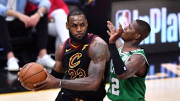 CLEVELAND, OH - MAY 21: LeBron James #23 of the Cleveland Cavaliers looks to pass against Terry Rozier #12 of the Boston Celtics in the third quarter during Game Four of the 2018 NBA Eastern Conference Finals at Quicken Loans Arena on May 21, 2018 in Cleveland, Ohio. NOTE TO USER: User expressly acknowledges and agrees that, by downloading and or using this photograph, User is consenting to the terms and conditions of the Getty Images License Agreement. (Photo by Jamie Sabau/Getty Images)