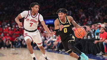 St. John's basketball guard Simeon Wilcher guards Dug McDaniel (Wendell Cruz-USA TODAY Sports)