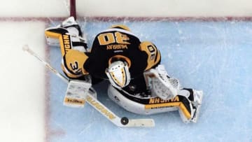 May 26, 2016; Pittsburgh, PA, USA; Pittsburgh Penguins goalie Matt Murray (30) makes a save against the Tampa Bay Lightning during the second period in game seven of the Eastern Conference Final of the 2016 Stanley Cup Playoffs at the CONSOL Energy Center. The Penguins won the game 2-1 and the Eastern Conference Championship four games to three. Mandatory Credit: Charles LeClaire-USA TODAY Sports