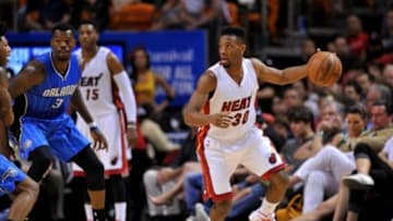 Dec 29, 2014; Miami, FL, USA; Miami Heat guard Norris Cole (30) dribbles the ball against Orlando Magic during the second half at American Airlines Arena. Mandatory Credit: Steve Mitchell-USA TODAY Sports