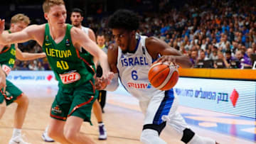 Israel's Shawn Dawson (R) vies for the ball with Lithuania's Marius Grigonis during the FIBA EuroBasket championship basketball match between Israel and Lithuania at Menora Mivtachim Arena in Tel Aviv, Israel, on September 2, 2017. (Photo credit: JACK GUEZ/AFP/Getty Images)