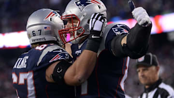 Jan 16, 2016; Foxborough, MA, USA; New England Patriots tight end Rob Gronkowski (87) celebrates with guard Josh Kline (67) after scoring a touchdown during the first quarter against the Kansas City Chiefs in the AFC Divisional round playoff game at Gillette Stadium. Mandatory Credit: Robert Deutsch-USA TODAY Sports