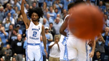CHAPEL HILL, NC - FEBRUARY 09: Coby White #2 of the North Carolina Tar Heels reacts after making a three-point shot in the second half of their game against the Miami Hurricanes at Dean Smith Center on February 9, 2019 in Chapel Hill, North Carolina. UNC won 88-85 in OT. (Photo by Lance King/Getty Images)