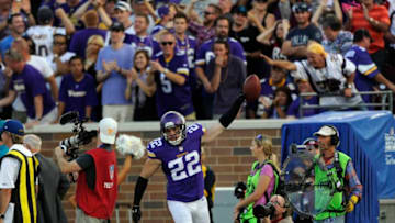 MINNEAPOLIS, MN - SEPTEMBER 28: Harrison Smith #22 of the Minnesota Vikings celebrates catching an interception against the Atlanta Falcons during the fourth quarter of the game on September 28, 2014 at TCF Bank Stadium in Minneapolis, Minnesota. The Vikings defeated the Falcons 41-28. (Photo by Hannah Foslien/Getty Images)