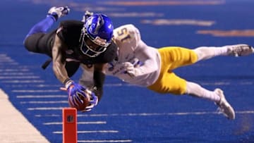 Nov 4, 2016; Boise, ID, USA; Boise State Broncos wide receiver Cedrick Wilson (1) dives into the end zone as San Jose State Spartans safety Chad Miller (15) tries to defend during second half action at Albertsons Stadium. Mandatory Credit: Brian Losness-USA TODAY Sports