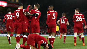 LIVERPOOL, ENGLAND - MARCH 17: Mohamed Salah of Liverpool celebrates scoring his side's second goal during the Premier League match between Liverpool and Watford at Anfield on March 17, 2018 in Liverpool, England. (Photo by Jan Kruger/Getty Images)