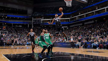 SACRAMENTO, CA - MARCH 6: De'Aaron Fox #5 of the Sacramento Kings dunks the ball against the Boston Celtics on March 6, 2019 at Golden 1 Center in Sacramento, California. NOTE TO USER: User expressly acknowledges and agrees that, by downloading and or using this Photograph, user is consenting to the terms and conditions of the Getty Images License Agreement. Mandatory Copyright Notice: Copyright 2019 NBAE (Photo by Rocky Widner/NBAE via Getty Images)