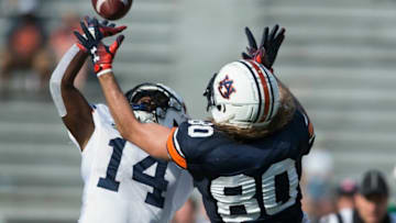 Auburn defensive back Traivon Leonard (14) breaks up a pass intended for Auburn tight end Sal Cannella (80) during the A-Day spring practice gameat Jordan-Hare Stadium in Auburn, Ala., on Saturday, April 13, 2019.Jc Auburnday 29
