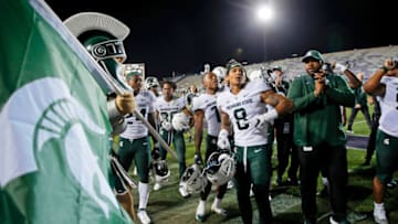 Sep 3, 2021; Evanston, Illinois, USA; The Michigan State Spartans celebrate their win over the Northwestern Wildcats at Ryan Field. The Michigan State Spartans won 38-21. Mandatory Credit: Jon Durr-USA TODAY Sports
