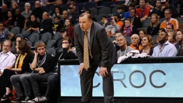 Feb 4, 2014; Phoenix, AZ, USA; Chicago Bulls head coach Tom Thibodeau watches on from the sidelines against the Phoenix Suns in the second half at US Airways Center. The Bulls won 101-92. Mandatory Credit: Jennifer Stewart-USA TODAY Sports