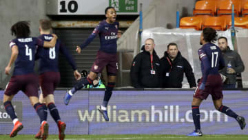 BLACKPOOL, ENGLAND - JANUARY 05: Joe Willock of Arsenal celebrates with teammates after scoring his team's first goal during the FA Cup Third Round match between Blackpool and Arsenal at Bloomfield Road on January 5, 2019 in Blackpool, United Kingdom. (Photo by Mark Robinson/Getty Images)
