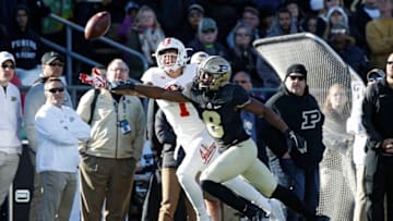 WEST LAFAYETTE, IN - NOVEMBER 25: Josh Okonye #8 of the Purdue Boilermakers defends a pass against Simmie Cobbs Jr. #1 of the Indiana Hoosiers in the fourth quarter of a game at Ross-Ade Stadium on November 25, 2017 in West Lafayette, Indiana. Purdue defeated Indiana 31-24. (Photo by Joe Robbins/Getty Images)