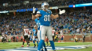 Dec 7, 2014; Detroit, MI, USA; Detroit Lions tight end Joseph Fauria (80) celebrates his touchdown during the third quarter against the Tampa Bay Buccaneers at Ford Field. Mandatory Credit: Tim Fuller-USA TODAY Sports