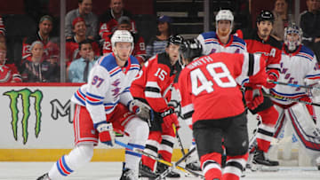 NEWARK, NEW JERSEY - SEPTEMBER 17: Timothy Gettinger #97 of the New York Rangers looks to block a shot by Ty Smith #48 of the New Jersey Devils during the second period during a preseason game at the Prudential Center on September 17, 2018 in Newark, New Jersey. (Photo by Bruce Bennett/Getty Images)
