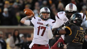 Oct 26, 2013; Columbia, MO, USA; South Carolina Gamecocks quarterback Dylan Thompson (17) throws a pass during the first half of the game against the Missouri Tigers at Faurot Field. Mandatory Credit: Denny Medley-USA TODAY Sports