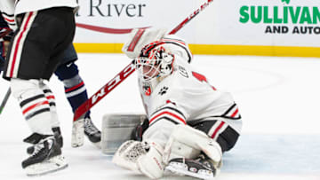 BOSTON, MA - MARCH 18: Devon Levi #1 of the Northeastern Huskies makes a save during the second period against the Connecticut Huskies during NCAA men's hockey in the Hockey East Championship semifinal at TD Garden on March 18, 2022 in Boston, Massachusetts. (Photo by Richard T Gagnon/Getty Images)