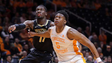 KNOXVILLE, TN - FEBRUARY 19: Admiral Schofield #5 of the Tennessee Volunteers blocks out Simisola Shittu #11 of the Vanderbilt Commodores during their game at Thompson-Boling Arena on February 19, 2019 in Knoxville, Tennessee. Tennessee won the game 58-46. (Photo by Donald Page/Getty Images)