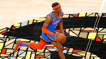 ATLANTA, GA - MARCH 18: Shai Gilgeous-Alexander #2 of the Oklahoma City Thunder drives down the court during the first half against the Atlanta Hawks at State Farm Arena on March 18, 2021 in Atlanta, Georgia. NOTE TO USER: User expressly acknowledges and agrees that, by downloading and/or using this photograph, user is consenting to the terms and conditions of the Getty Images License Agreement. (Photo by Todd Kirkland/Getty Images)
