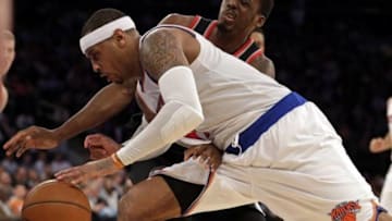 Mar 1, 2016; New York, NY, USA; New York Knicks forward Carmelo Anthony (7) drives to the basket past Portland Trail Blazers forward Al-Farouq Aminu (8) during the second half at Madison Square Garden. The Trail Blazers defeated the Knicks 104-85. Mandatory Credit: Adam Hunger-USA TODAY Sports