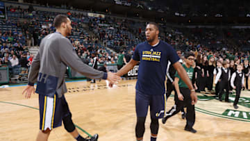 Milwaukee, WI - MARCH 20: Derrick Favors #15 of the Utah Jazz shakes hands with Rudy Gobert #27 of the Utah Jazz before the game against the Milwaukee Bucks on March 20, 2016 at the BMO Harris Bradley Center in Milwaukee, Wisconsin. Copyright 2016 NBAE (Photo by Gary Dineen/NBAE via Getty Images)
