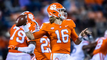 Oct 3, 2020; Clemson, South Carolina, USA; Clemson quarterback Trevor Lawrence (16) looks to make a pass during their game against Virginia at Memorial Stadium. Mandatory Credit: Ken Ruinard-USA TODAY Sports