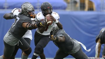 Sep 26, 2020; Pittsburgh, Pennsylvania, USA; Pittsburgh Panthers defensive lineman Rashad Weaver (17) and defensive lineman Keyshon Camp (10) sack Louisville Cardinals quarterback cduring the third quarter at Heinz Field. Pittsburgh won 23-20. Mandatory Credit: Charles LeClaire-USA TODAY Sports