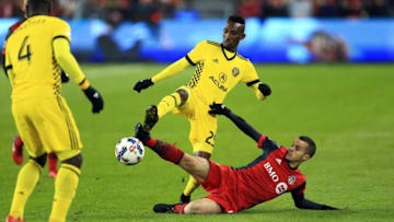 TORONTO, ON - NOVEMBER 29: Sebastian Giovinco #10 of Toronto FC battles for the ball with Harrison Afful #25 of Columbus Crew SC during the second half of the MLS Eastern Conference Finals, Leg 2 game at BMO Field on November 29, 2017 in Toronto, Ontario, Canada. (Photo by Vaughn Ridley/Getty Images)