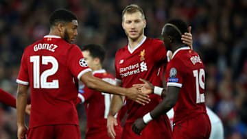 LIVERPOOL, ENGLAND - DECEMBER 06: Sadio Mane of Liverpool celebrates after scoring his sides fifth goal with Joe Gomez of Liverpool and Ragnar Klavan of Liverpool during the UEFA Champions League group E match between Liverpool FC and Spartak Moskva at Anfield on December 6, 2017 in Liverpool, United Kingdom. (Photo by Clive Brunskill/Getty Images)