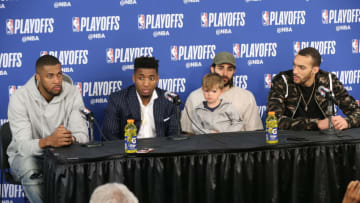 OKLAHOMA CITY, OK - APRIL 18 - Derrick Favors #15 Donovan Mitchell #45 Ricky Rubio #3 and Rudy Gobert #27 of the Utah Jazz talk to the media after Game Two of Round One of the 2018 NBA Playoffs Oklahoma City Thunder on April 18 2018 at Chesapeake Energy Arena in Oklahoma City, Oklahoma. NOTE TO USER: User expressly acknowledges and agrees that, by downloading and or using this photograph, User is consenting to the terms and conditions of the Getty Images License Agreement. Mandatory Copyright Notice: Copyright 2018 NBAE (Photo by Layne Murdoch Sr./NBAE via Getty Images)