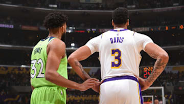 LOS ANGELES, CA - DECEMBER 8: Karl-Anthony Towns #32 of the Minnesota Timberwolves and Anthony Davis #3 of the Los Angeles Lakers stand on the court on December 8, 2019 at STAPLES Center in Los Angeles, California. NOTE TO USER: User expressly acknowledges and agrees that, by downloading and/or using this Photograph, user is consenting to the terms and conditions of the Getty Images License Agreement. Mandatory Copyright Notice: Copyright 2019 NBAE (Photo by Adam Pantozzi/NBAE via Getty Images)