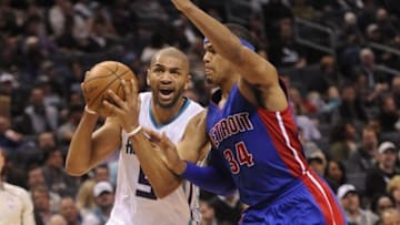 Dec 7, 2016; Charlotte, NC, USA; Charlotte Hornets guard forward Nicolas Batum (5) drives to the basket as he is defended by Detroit Pistons forward Tobias Harris (34) during the second half of the game at the Spectrum Center. Hornets win 87-77. Mandatory Credit: Sam Sharpe-USA TODAY Sports