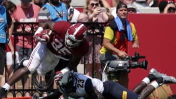 Sep 24, 2016; Tuscaloosa, AL, USA; Alabama Crimson Tide running back Joshua Jacobs (25) is hit from behind by Kent State Golden Flashes defensive back Jerrell Foster (23) at Bryant-Denny Stadium. Mandatory Credit: Marvin Gentry-USA TODAY Sports