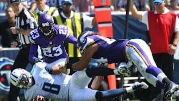 Sep 11, 2016; Nashville, TN, USA; Tennessee Titans quarterback Marcus Mariota (8) is tackled after a short gain against the Minnesota Vikings at Nissan Stadium. Mandatory Credit: Christopher Hanewinckel-USA TODAY Sports