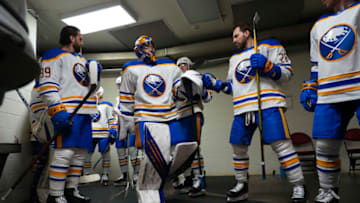 Apr 7, 2022; Raleigh, North Carolina, USA; Buffalo Sabres goaltender Craig Anderson (41) comes out of the locker room past left wing Zemgus Girgensons (28) and right wing Alex Tuch (89) against the Carolina Hurricanes before the game at PNC Arena. Mandatory Credit: James Guillory-USA TODAY Sports