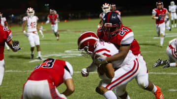 Peoria Centennial football's James Scott tackles Santa Ana Mater Dei football's Domani Jackson, September 6, 2019.Uscp 76zz00pnr0x1bpyhxbxe Original