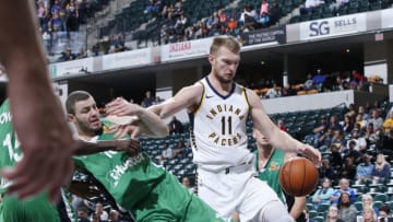 INDIANAPOLIS, IN - OCTOBER 10: Domantas Sabonis #11 of the Indiana Pacers fights for a rebound against Netanel Artzi #10 of Maccabi Haifa during a preseason game at Bankers Life Fieldhouse on October 10, 2017 in Indianapolis, Indiana. NOTE TO USER: User expressly acknowledges and agrees that, by downloading and or using the photograph, User is consenting to the terms and conditions of the Getty Images License Agreement. (Photo by Joe Robbins/Getty Images)