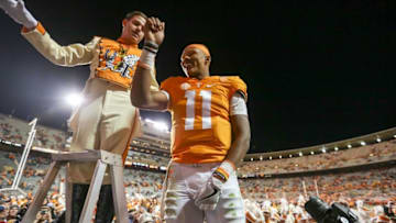 Nov 19, 2016; Knoxville, TN, USA; Tennessee Volunteers quarterback Joshua Dobbs (11) directs the band after the game against the Missouri Tigers at Neyland Stadium. Tennessee won 63 to 37. Mandatory Credit: Randy Sartin-USA TODAY Sports