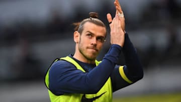 Tottenham Hotspur's Welsh midfielder Gareth Bale ackowledges the fans during the English Premier League football match between Tottenham Hotspur and Aston Villa at Tottenham Hotspur Stadium in London, on May 19, 2021. - - RESTRICTED TO EDITORIAL USE. No use with unauthorized audio, video, data, fixture lists, club/league logos or 'live' services. Online in-match use limited to 120 images. An additional 40 images may be used in extra time. No video emulation. Social media in-match use limited to 120 images. An additional 40 images may be used in extra time. No use in betting publications, games or single club/league/player publications. (Photo by DANIEL LEAL-OLIVAS / POOL / AFP) / RESTRICTED TO EDITORIAL USE. No use with unauthorized audio, video, data, fixture lists, club/league logos or 'live' services. Online in-match use limited to 120 images. An additional 40 images may be used in extra time. No video emulation. Social media in-match use limited to 120 images. An additional 40 images may be used in extra time. No use in betting publications, games or single club/league/player publications. / RESTRICTED TO EDITORIAL USE. No use with unauthorized audio, video, data, fixture lists, club/league logos or 'live' services. Online in-match use limited to 120 images. An additional 40 images may be used in extra time. No video emulation. Social media in-match use limited to 120 images. An additional 40 images may be used in extra time. No use in betting publications, games or single club/league/player publications. (Photo by DANIEL LEAL-OLIVAS/POOL/AFP via Getty Images)