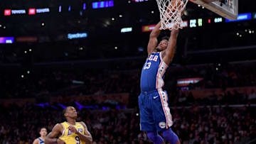 LOS ANGELES, CALIFORNIA - JANUARY 29: Jimmy Butler #23 of the Philadelphia 76ers dunks in front of Rajon Rondo #9 of the Los Angeles Lakers during the first half at Staples Center on January 29, 2019 in Los Angeles, California. NOTE TO USER: User expressly acknowledges and agrees that, by downloading and or using this photograph, User is consenting to the terms and conditions of the Getty Images License Agreement. (Photo by Harry How/Getty Images)